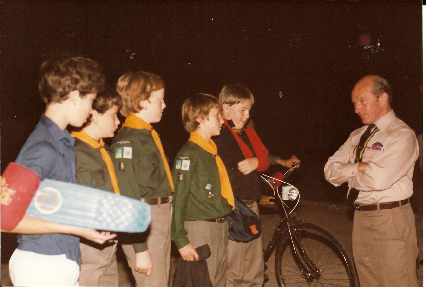 Scouts believed to be acting out a first aid incident to the Chief Scout Major-General Michael Walsh